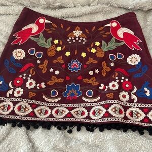 Never worn embroidered skirt cute tassels at the bottom size large